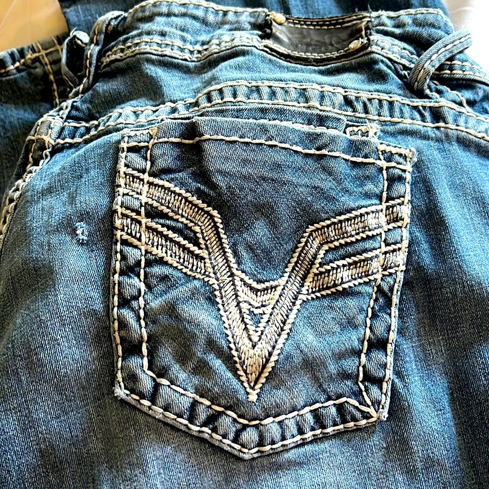 Vigoss jeans. Bought with slits in them.